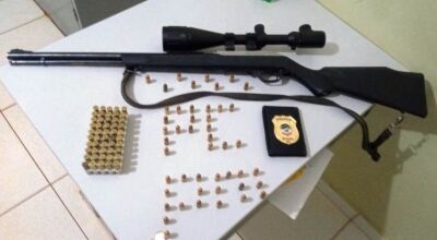 Arma apreendida e as munições - Foto: Divulgação
