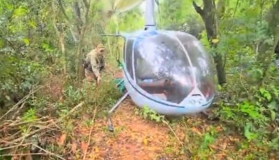 Polícia encontra helicóptero do tráfico abandonado em mata na região de fronteira