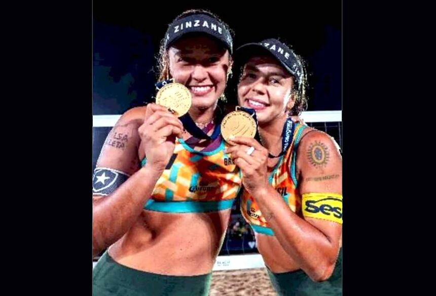 Thâmela (à esquerda) e Vic Lopes protagonizaram quatro viradas em sete partidas disputadas em Montréal (Foto: Volleyball world)